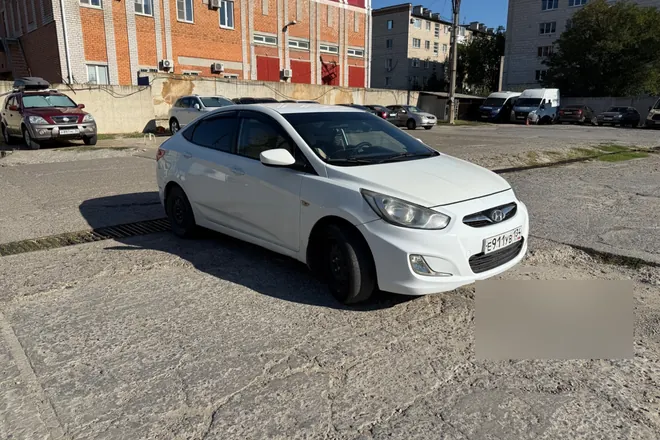 Реальный выкупленный автомобиль: белый hyundai solaris